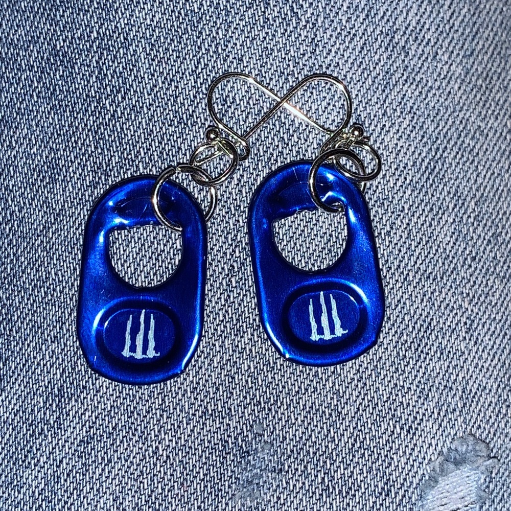 dark blue dangly monster ear rings